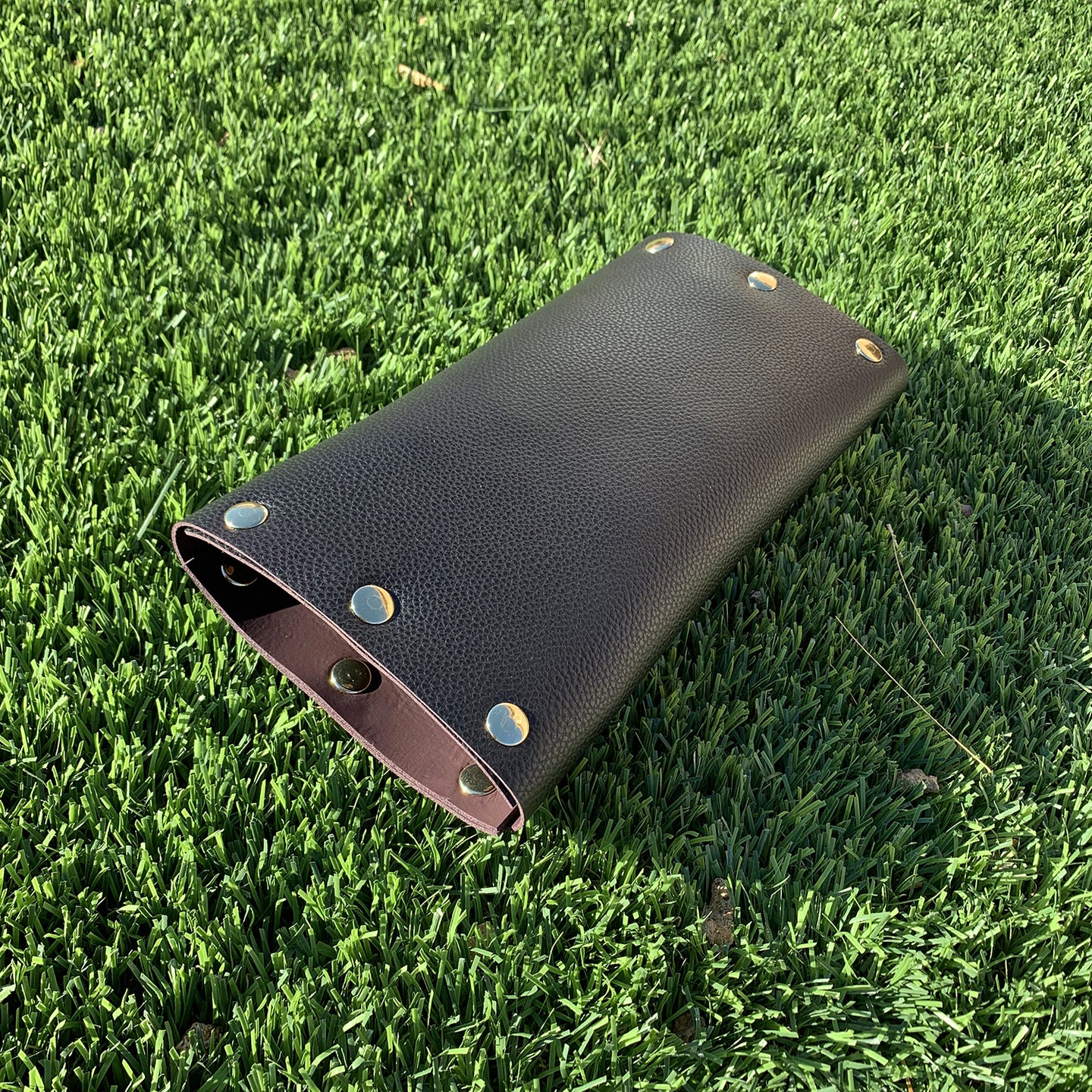 Newspaper Roll Black & Mauve Leather Clutch