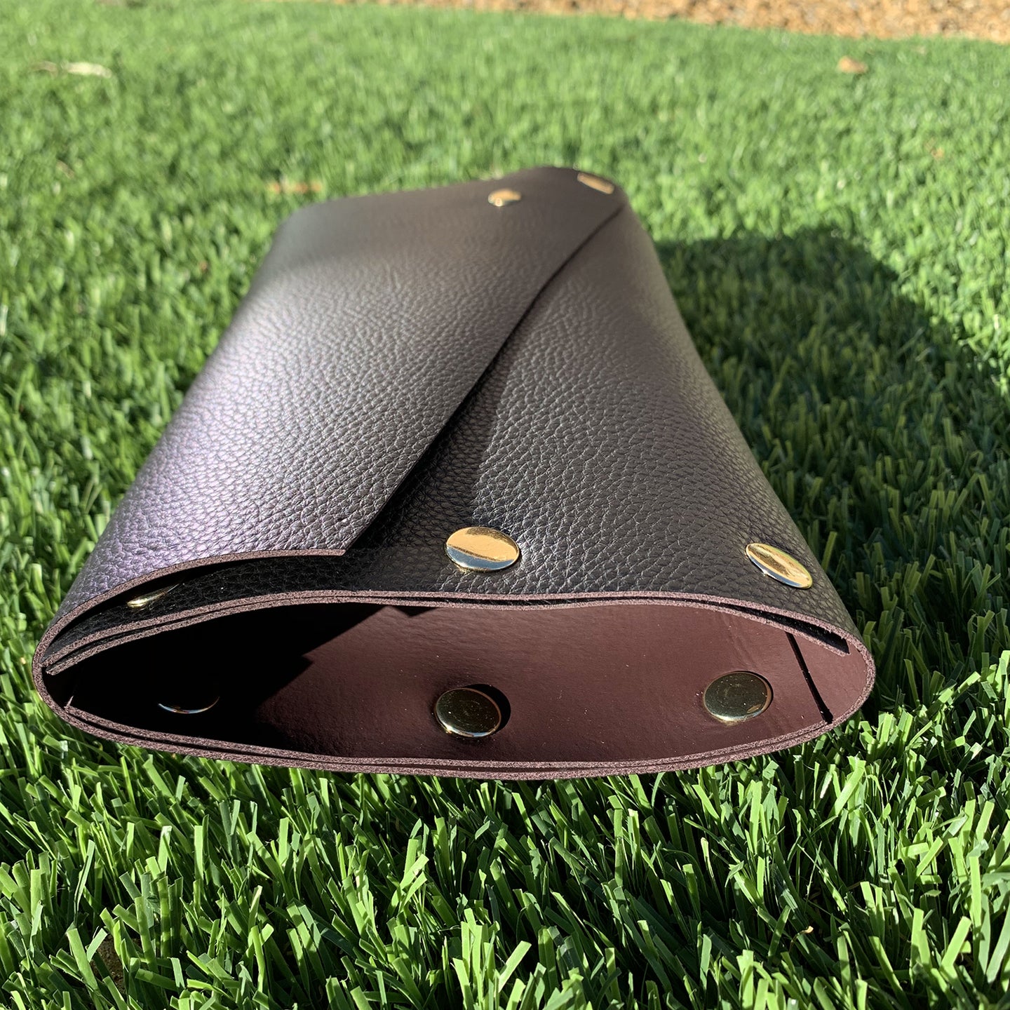 Newspaper Roll Black & Mauve Leather Clutch