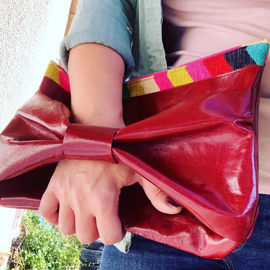 The Inevitable Red Leather Bow Rainbow Clutch
