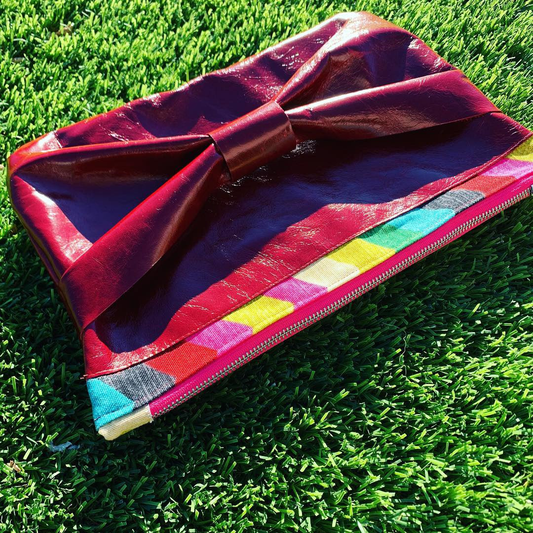 The Inevitable Red Leather Bow Rainbow Clutch