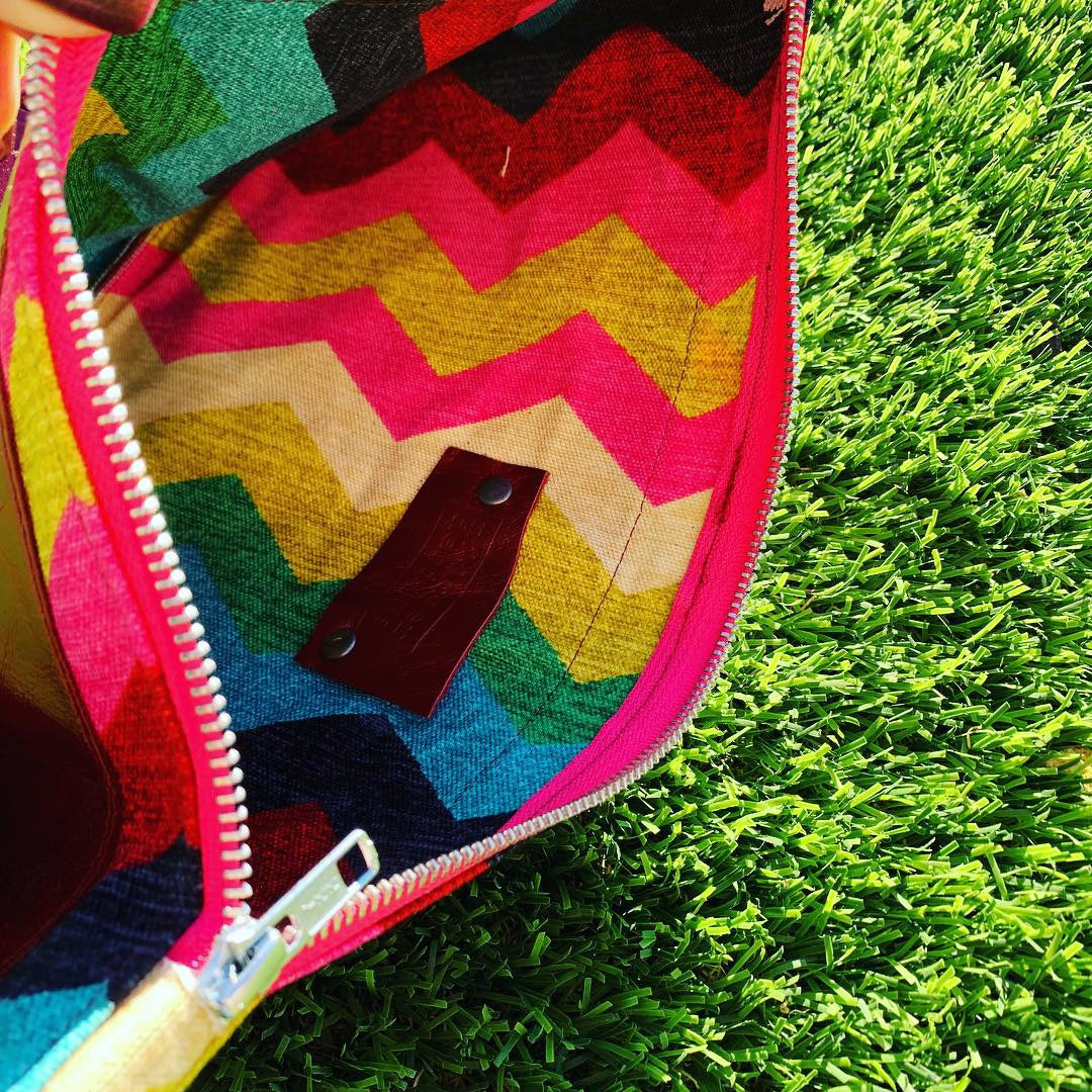 The Inevitable Red Leather Bow Rainbow Clutch