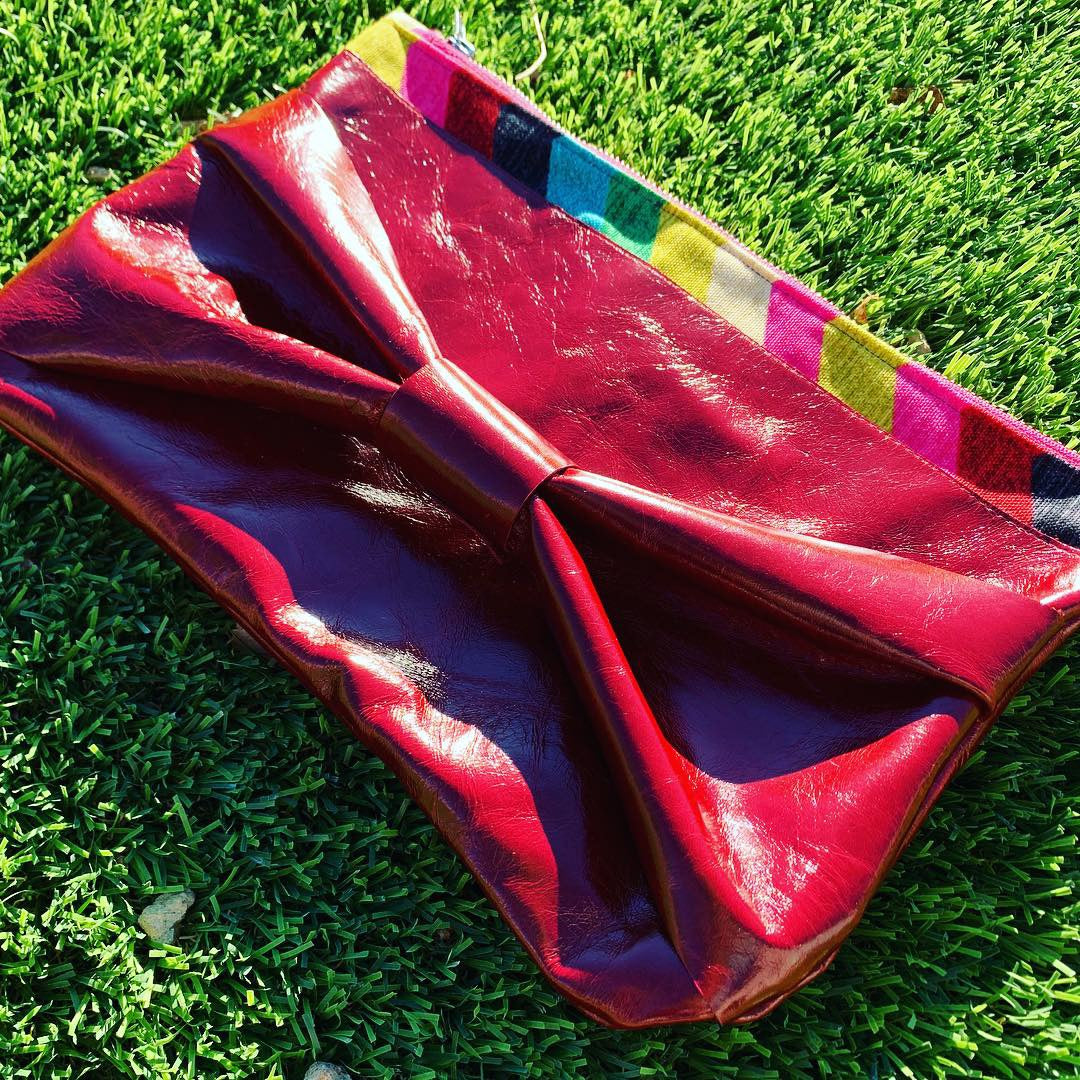 The Inevitable Red Leather Bow Rainbow Clutch